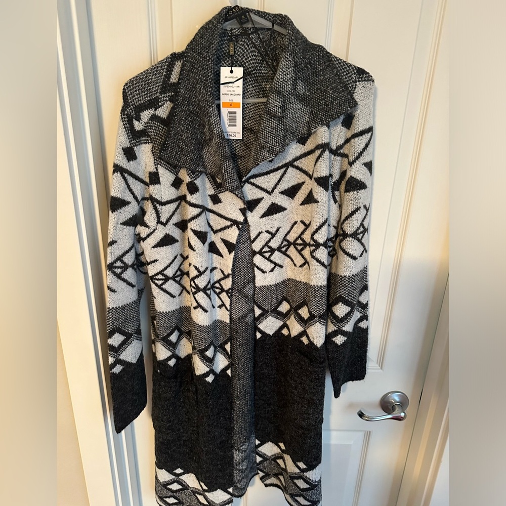 Black and white, tags still attached, never worn